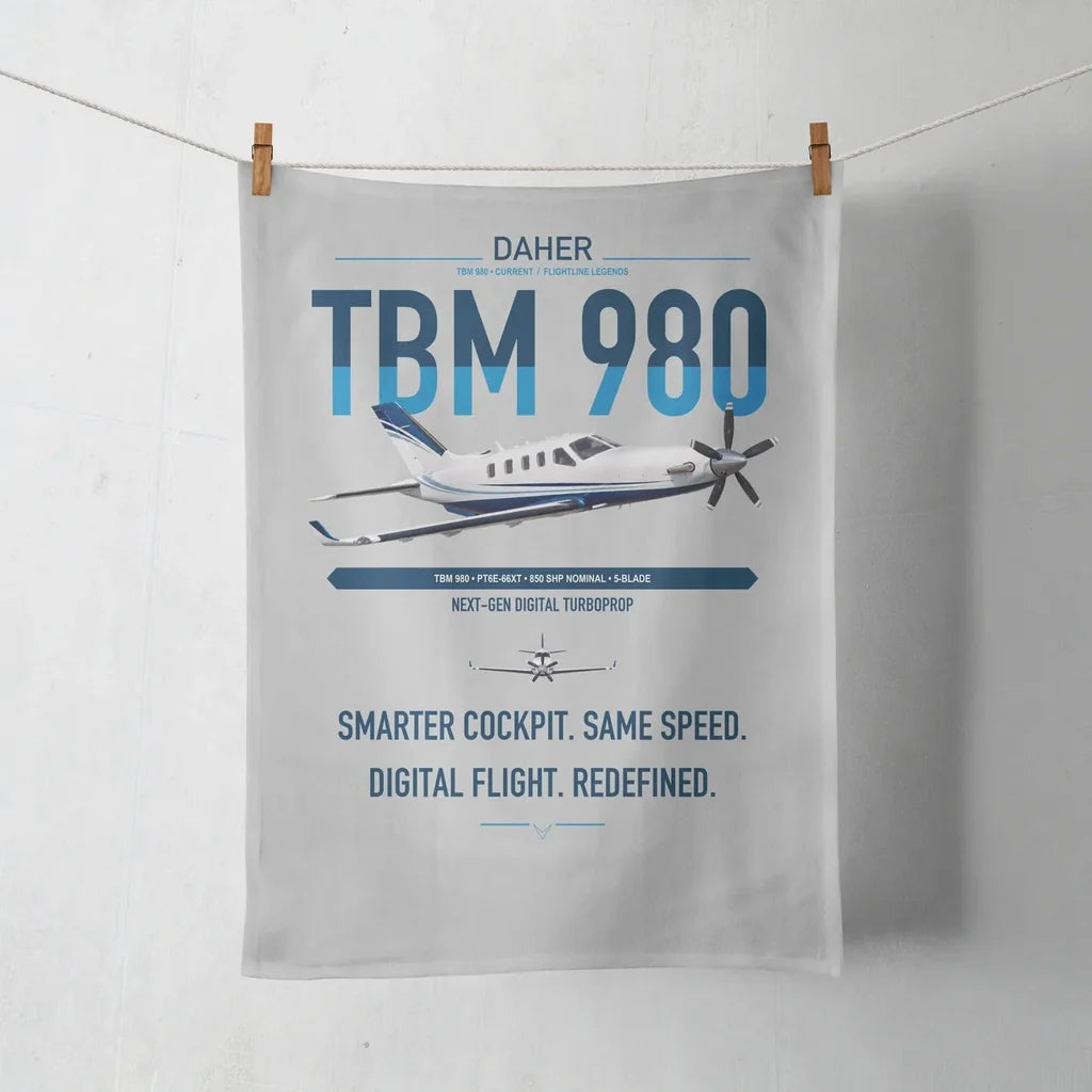 Daher TBM 980 design on light gray towel