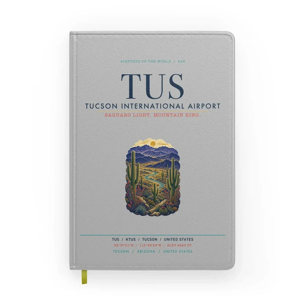Tucson International Airport (TUS) design on light gray notebook