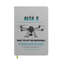 Thumbnail for Freefly Alta X design on light gray notebook