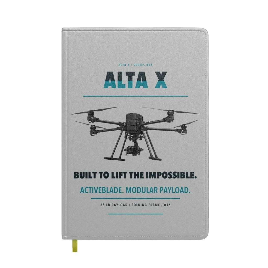 Freefly Alta X design on light gray notebook