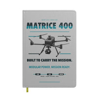 Thumbnail for DJI Matrice 400 design on light gray notebook
