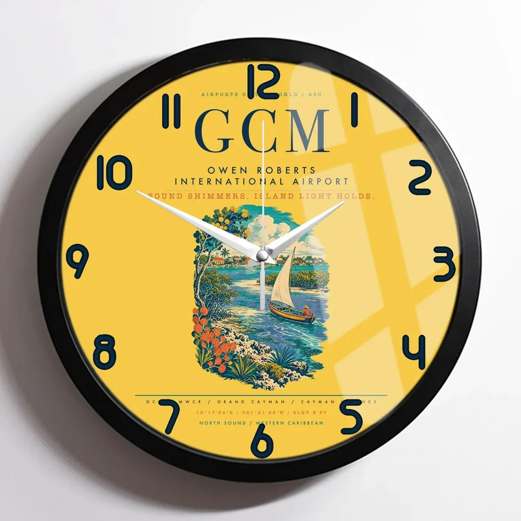 Owen Roberts International Airport (GCM) design on yellow framed wall clock