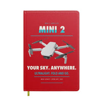 Thumbnail for DJI Mini 2 design on red notebook
