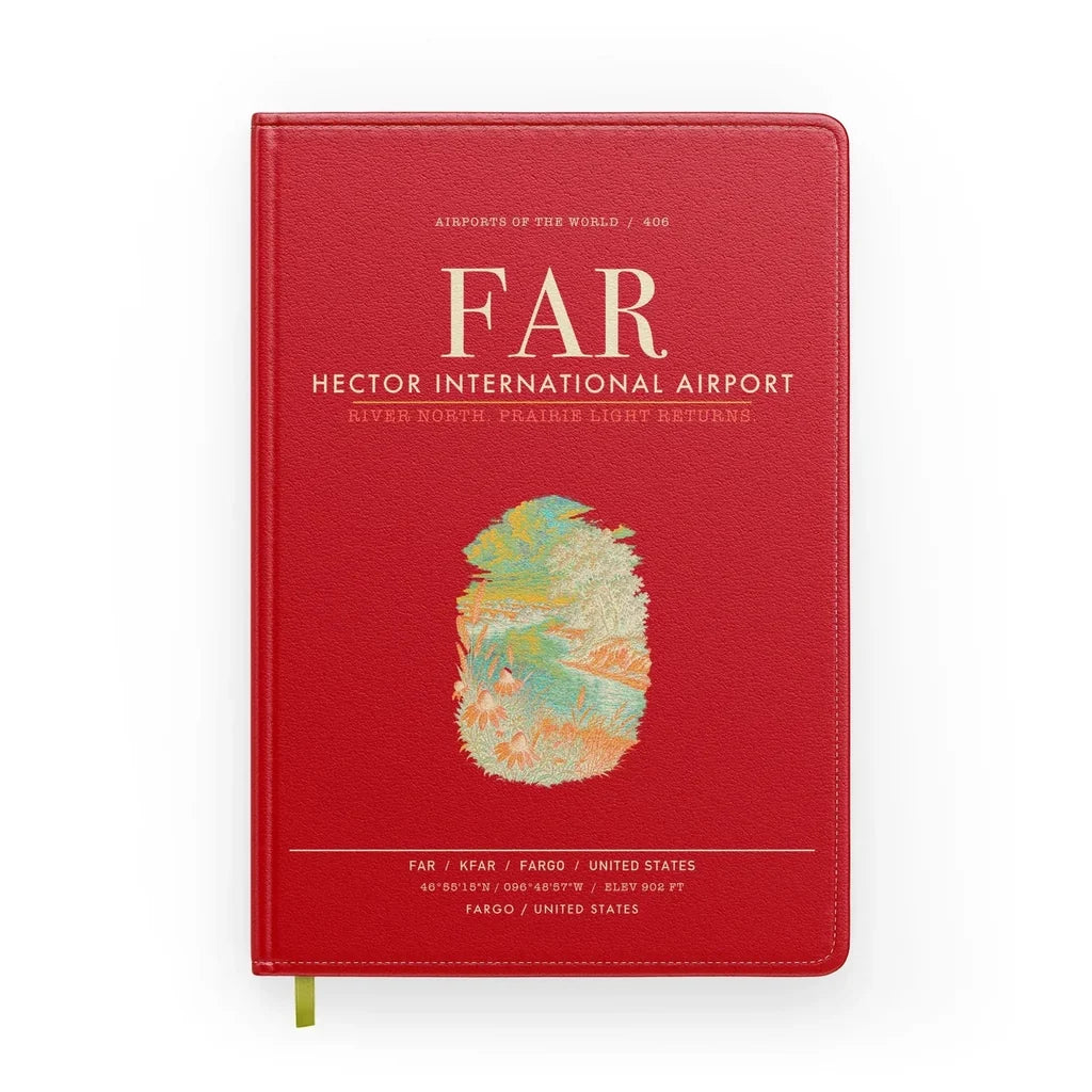 Hector International Airport (FAR) design on red notebook