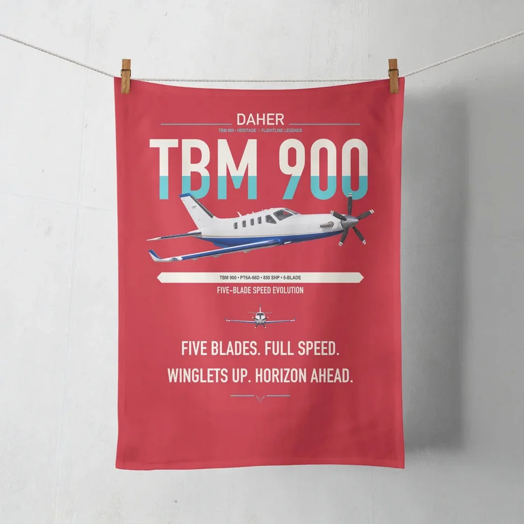 Daher TBM 900 design on red towel
