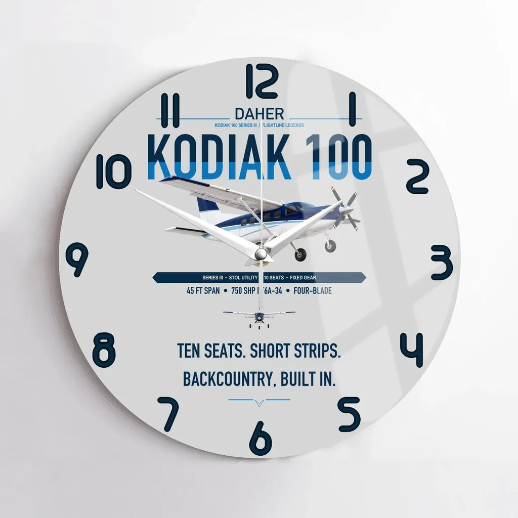 Daher Kodiak 100 Series III design on light gray no frame wall clock