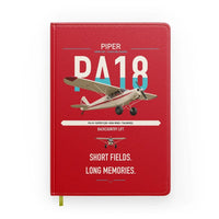 Thumbnail for Piper PA-18 Super Cub design on red notebook