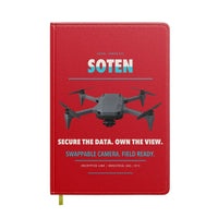 Thumbnail for ACSL SOTEN design on red notebook