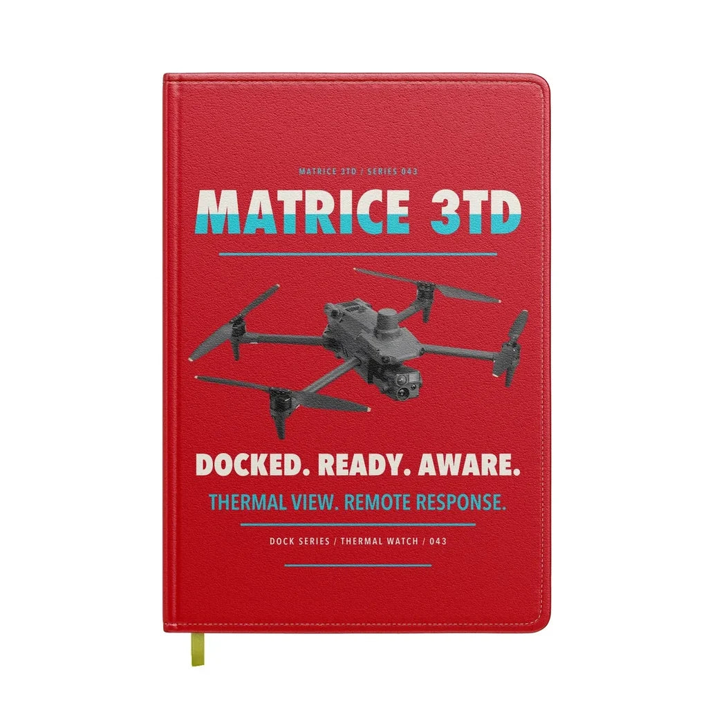 DJI Matrice 3TD design on red notebook