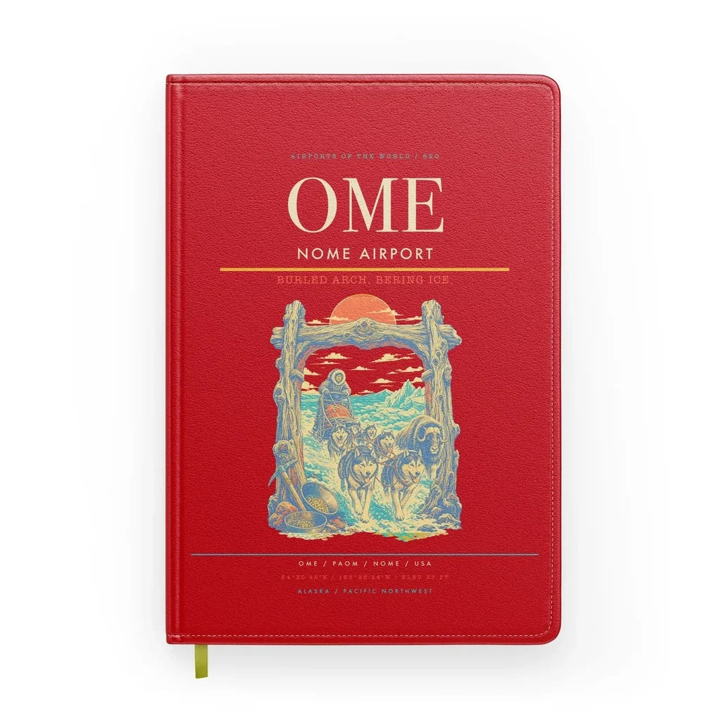 Nome Airport (OME) design on red notebook