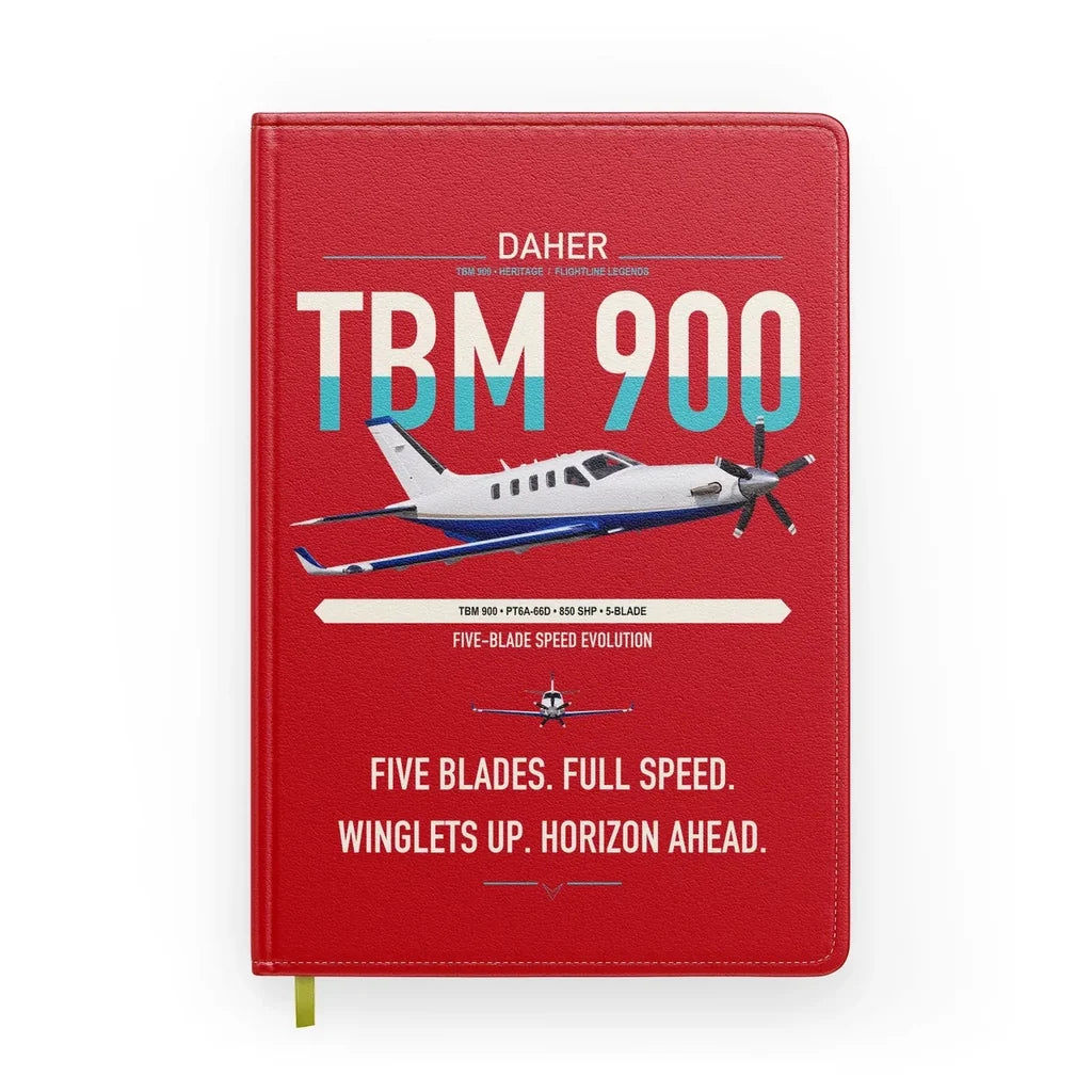 Daher TBM 900 design on red notebook