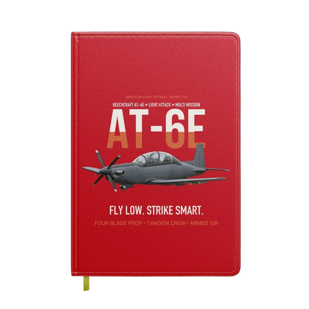 AT-6E Wolverine Light Attack design on red notebook