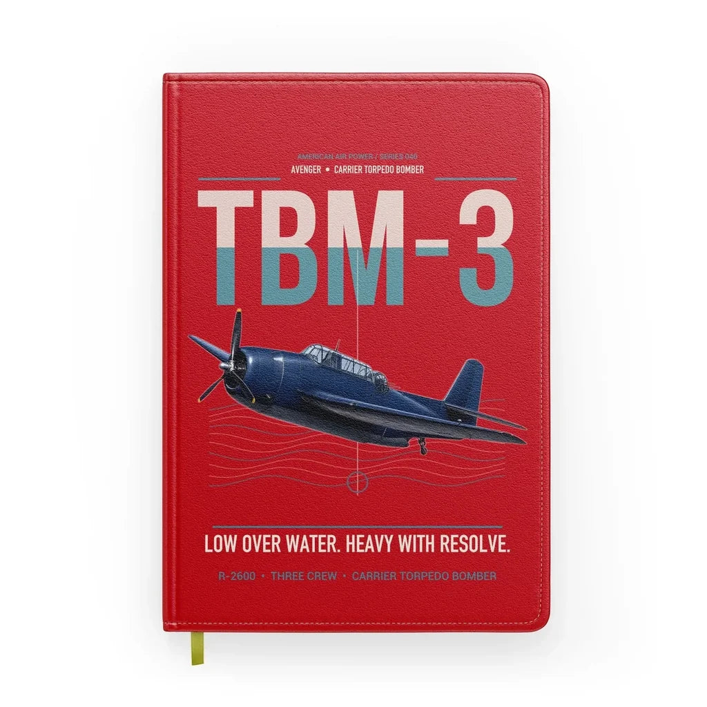 TBM-3 Avenger design on red notebook