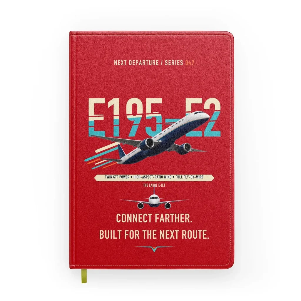 Embraer E195-E2 design on red notebook