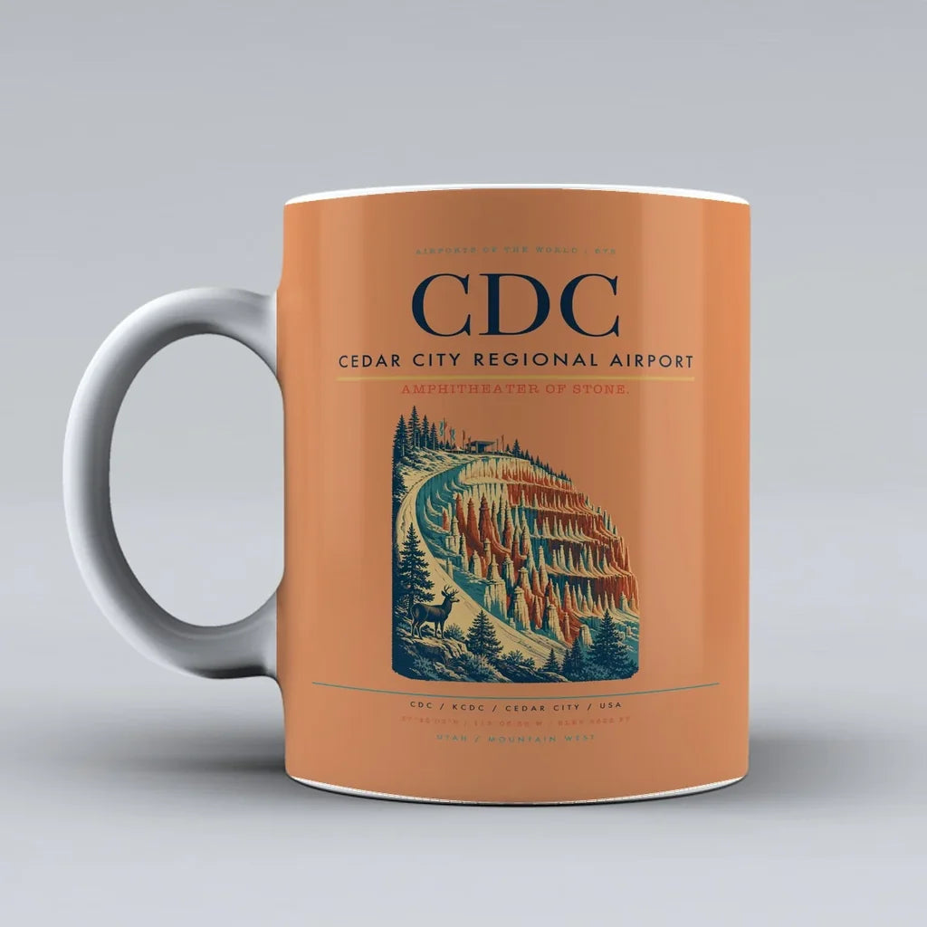 Cedar City Regional Airport (CDC) airport code design on orange ceramic mug