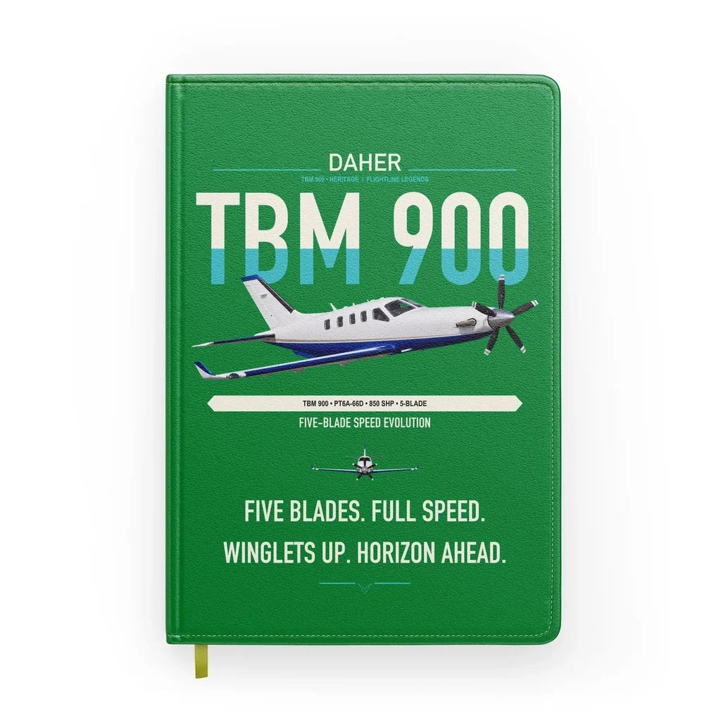 Daher TBM 900 design on green notebook