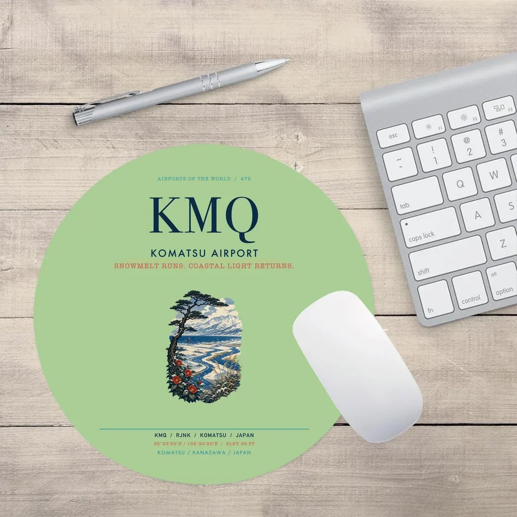 Komatsu Airport (KMQ) design on light green round mouse pad