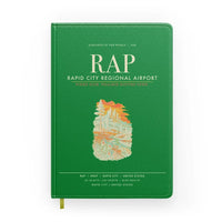 Thumbnail for Rapid City Regional Airport (RAP) design on green notebook