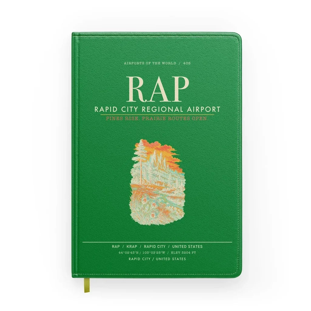 Rapid City Regional Airport (RAP) design on green notebook