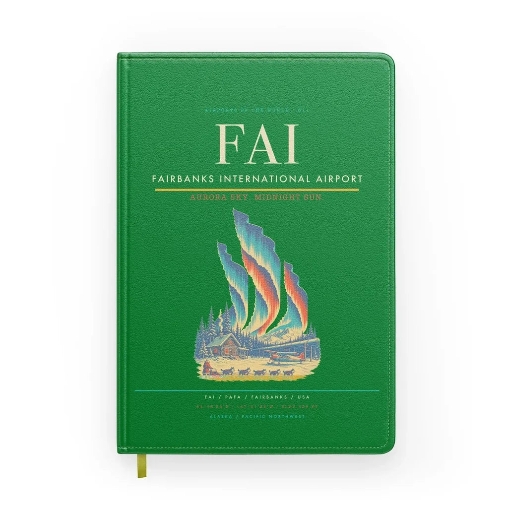 Fairbanks International Airport (FAI) design on green notebook