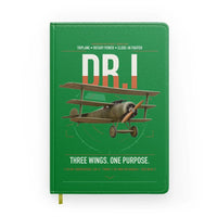 Thumbnail for Fokker Dr.I design on green notebook