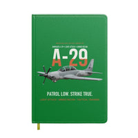 Thumbnail for A-29 Super Tucano Light Attack design on green notebook