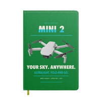 Thumbnail for DJI Mini 2 design on green notebook