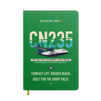 Thumbnail for Airbus CN235-300M design on green notebook