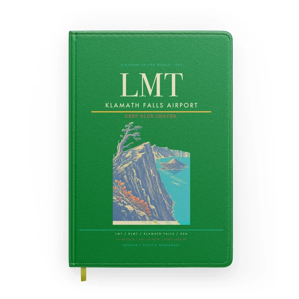 Klamath Falls Airport (LMT) design on green notebook