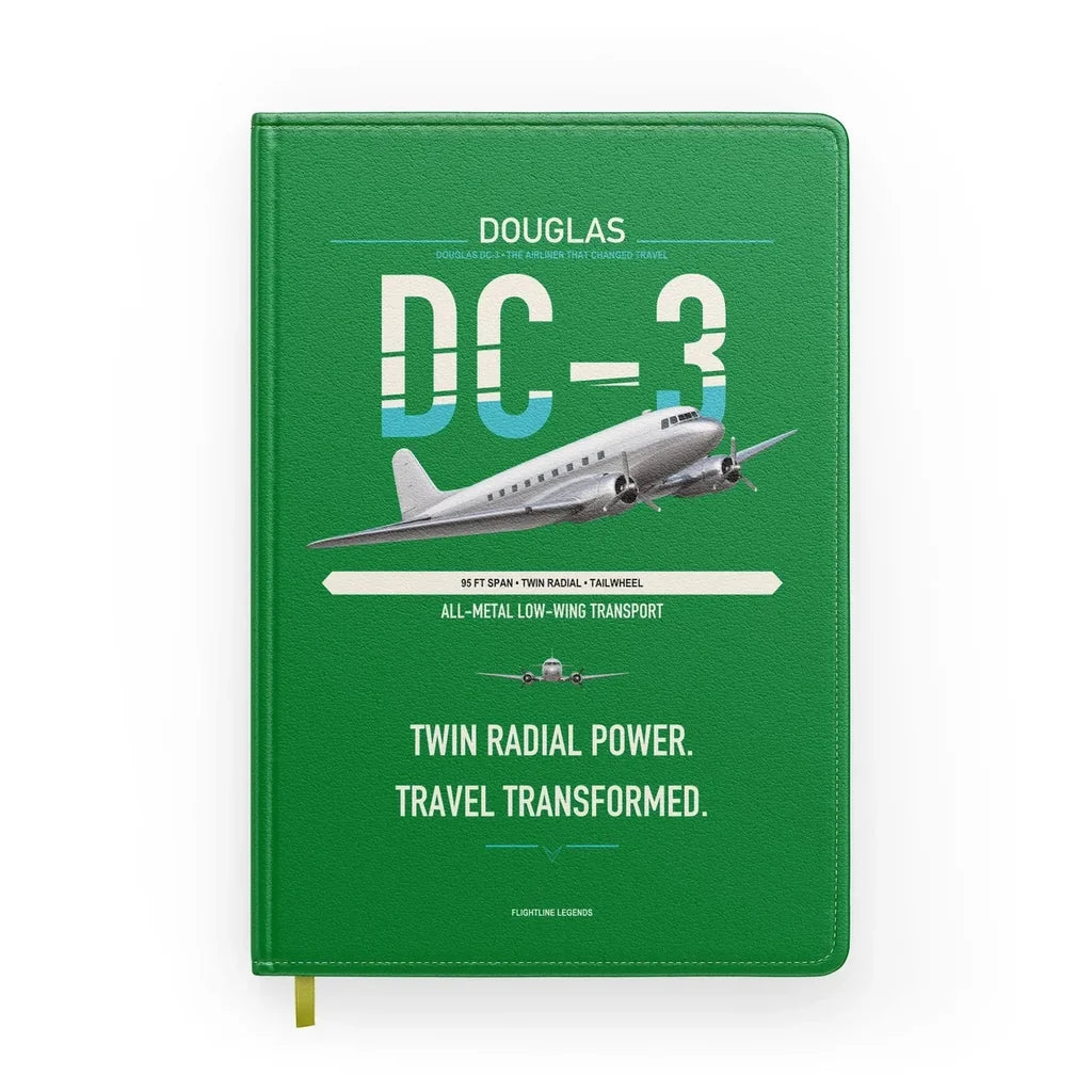 Douglas DC-3 design on green notebook