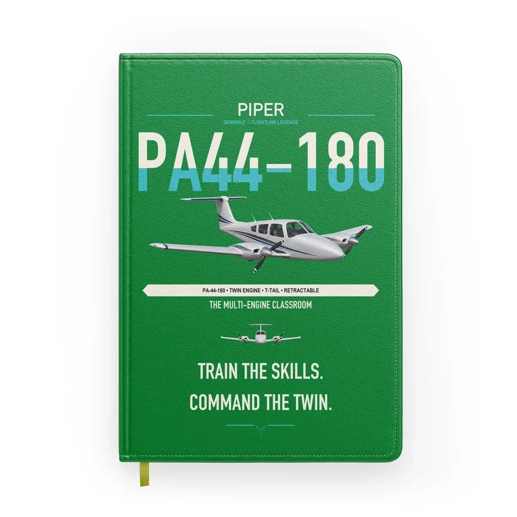 Piper PA-44-180 Seminole design on green notebook