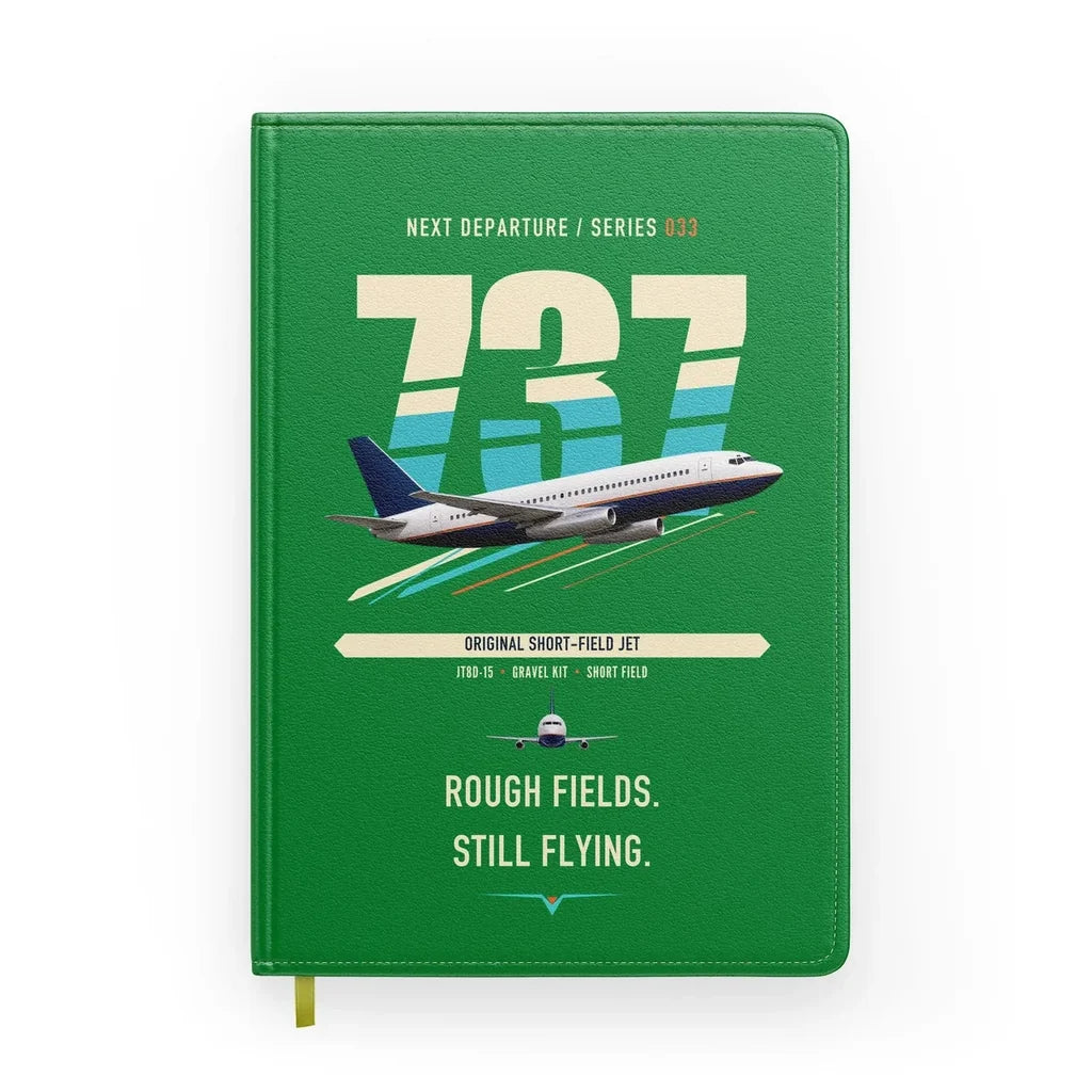 Boeing 737-200 design on green notebook