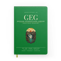 Thumbnail for Spokane International Airport (GEG) design on green notebook