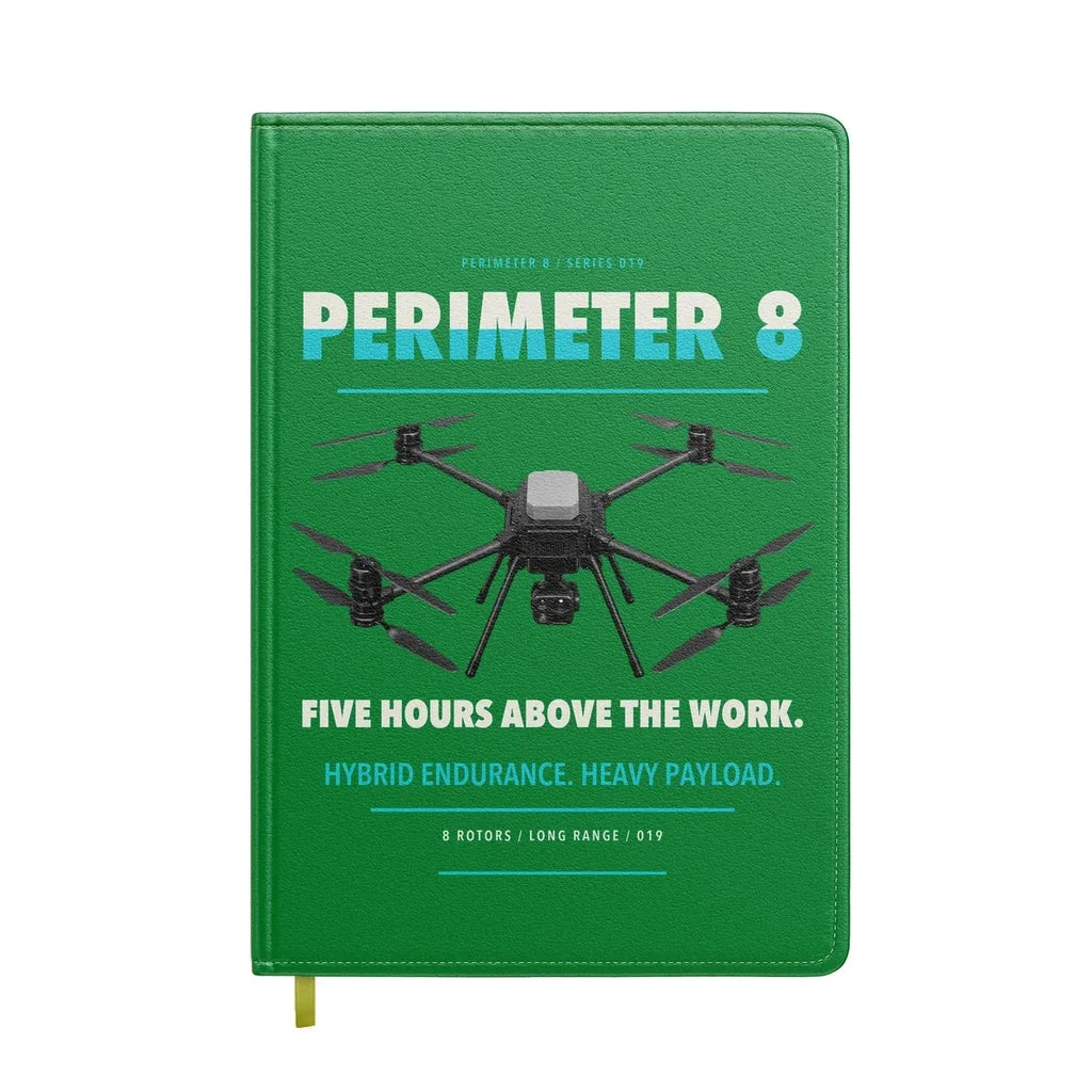 Skyfront Perimeter 8 design on green notebook