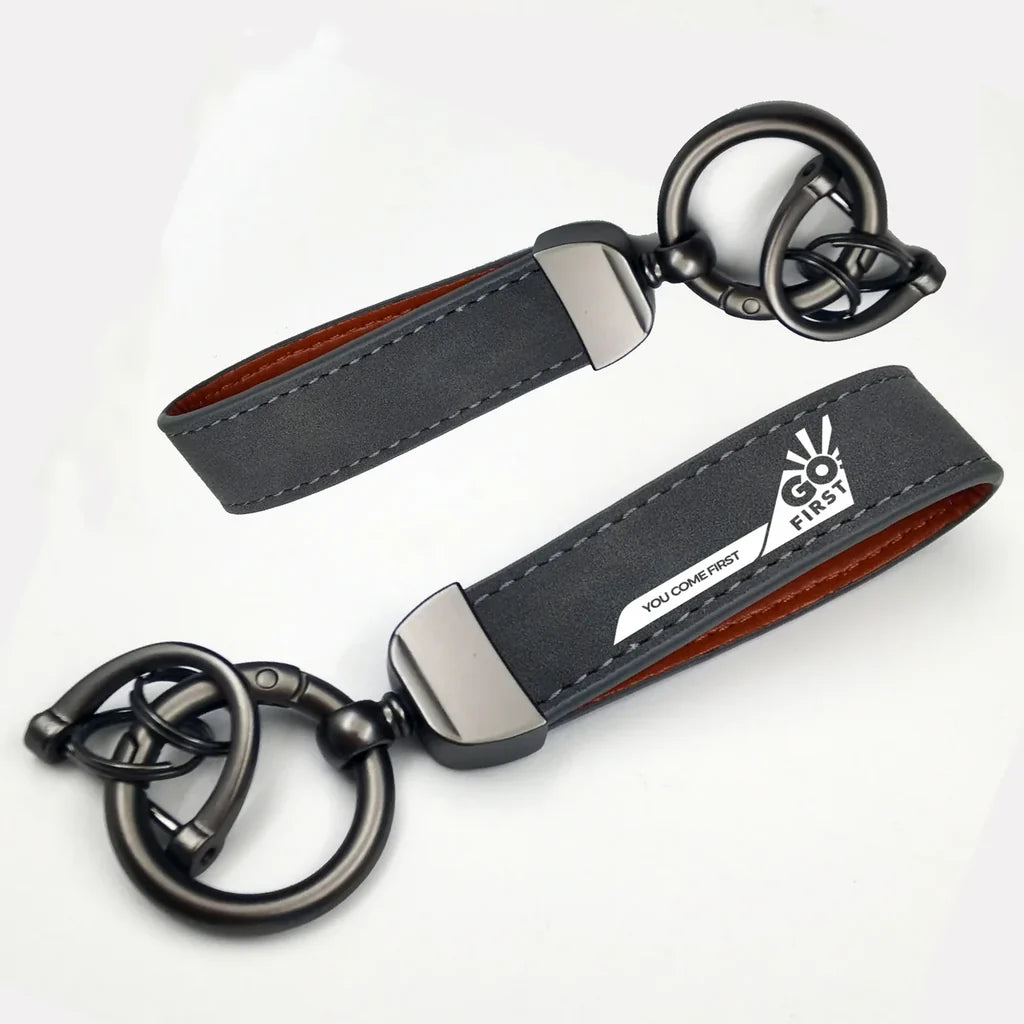 Go First Horseshoe Buckle key chain in gray