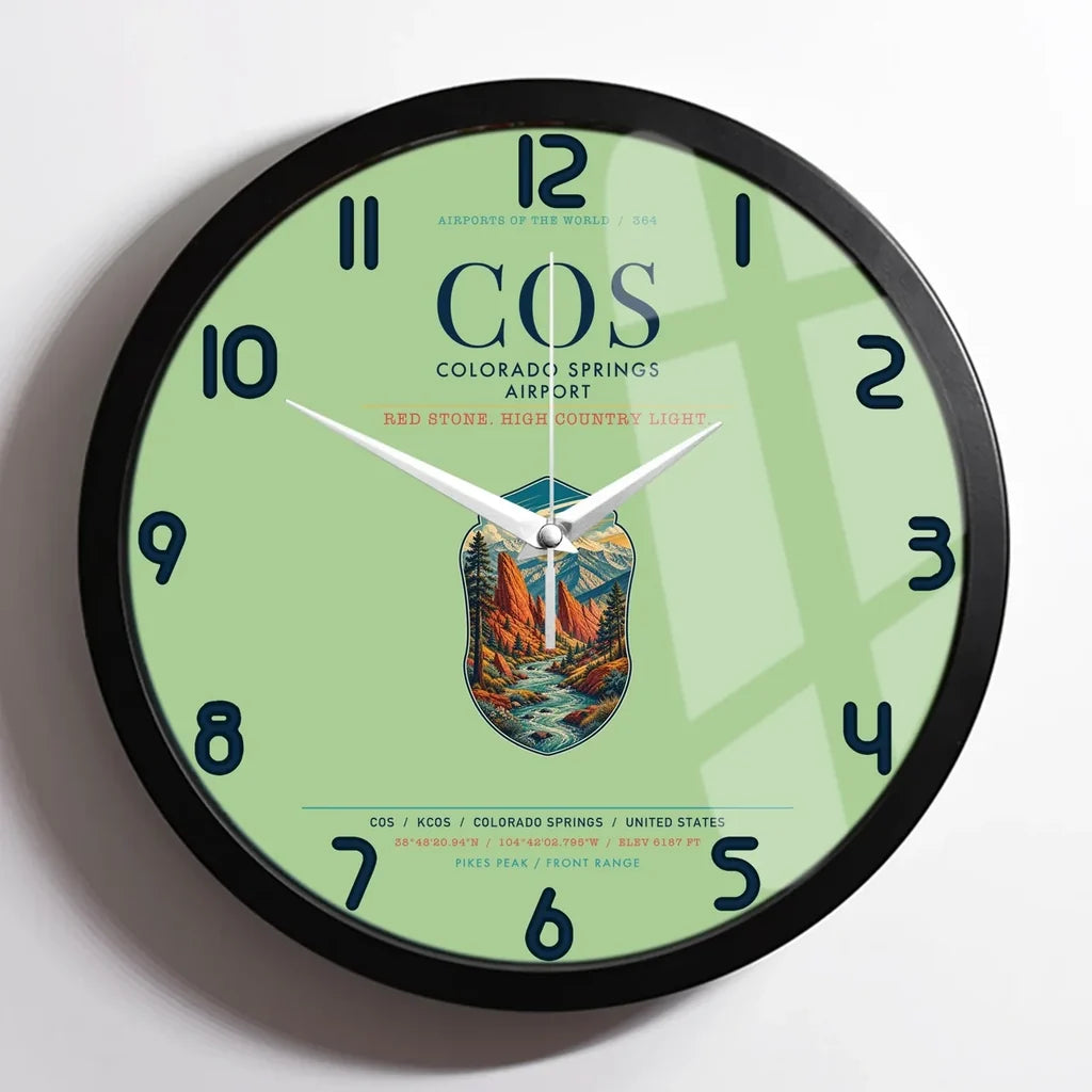 Colorado Springs Airport (COS) design on light green framed wall clock