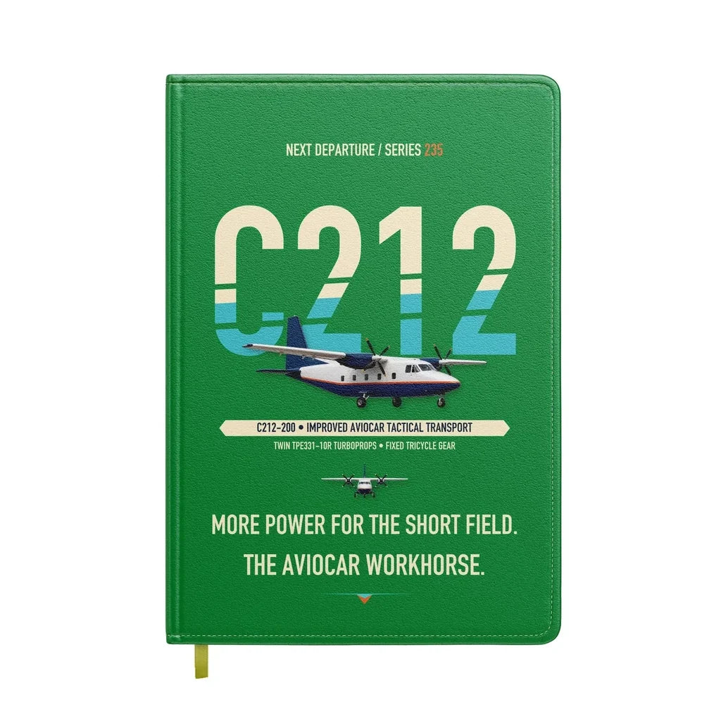CASA C-212-200 Aviocar design on green notebook