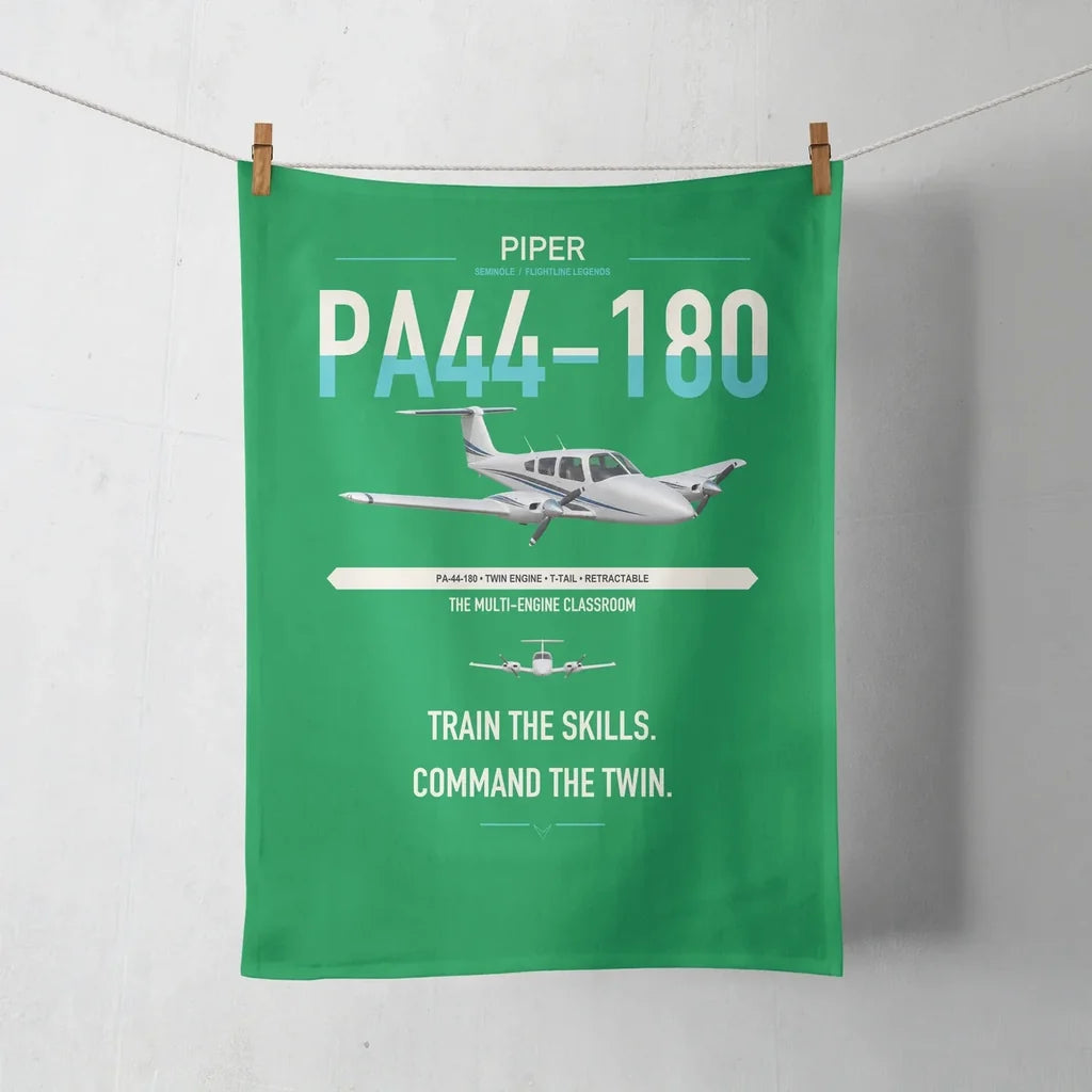 Piper PA-44-180 Seminole design on green towel