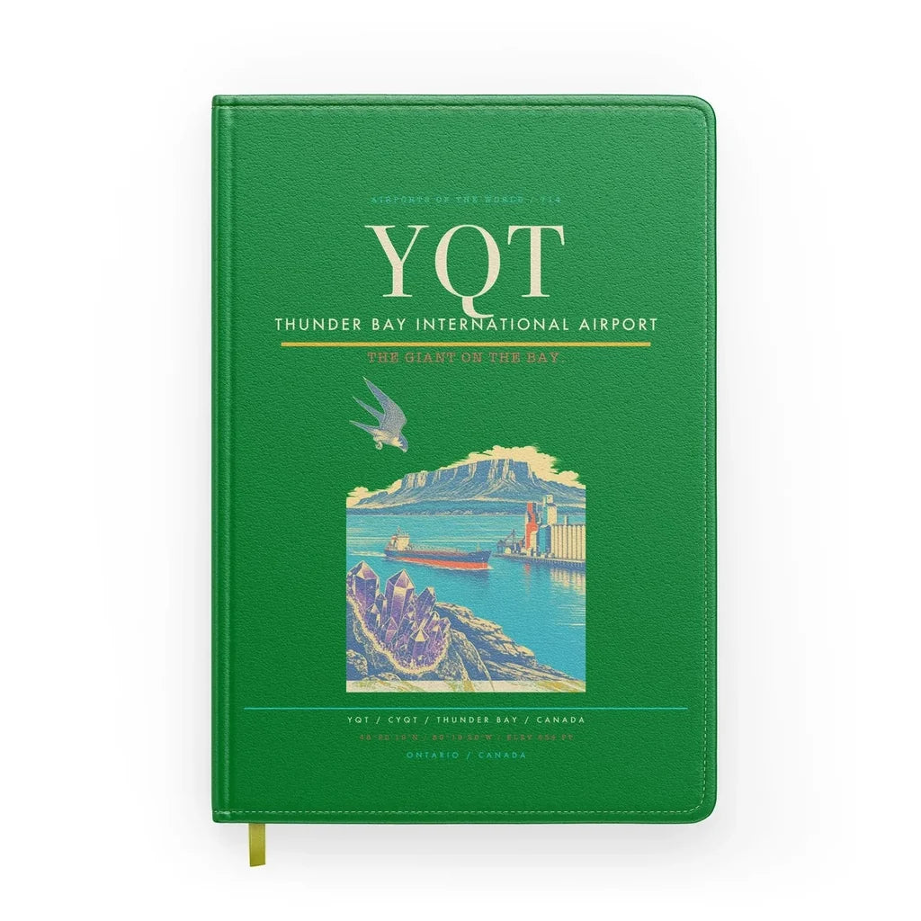 Thunder Bay International Airport (YQT) design on green notebook