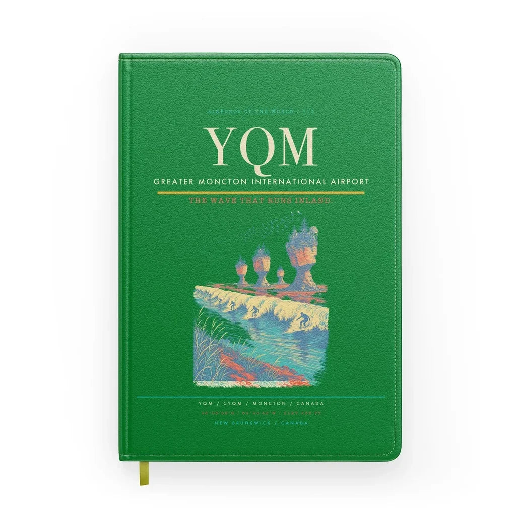 Greater Moncton International Airport (YQM) design on green notebook