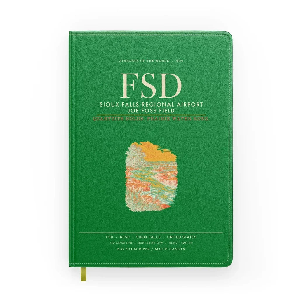 Sioux Falls Regional Airport Joe Foss Field (FSD) design on green notebook
