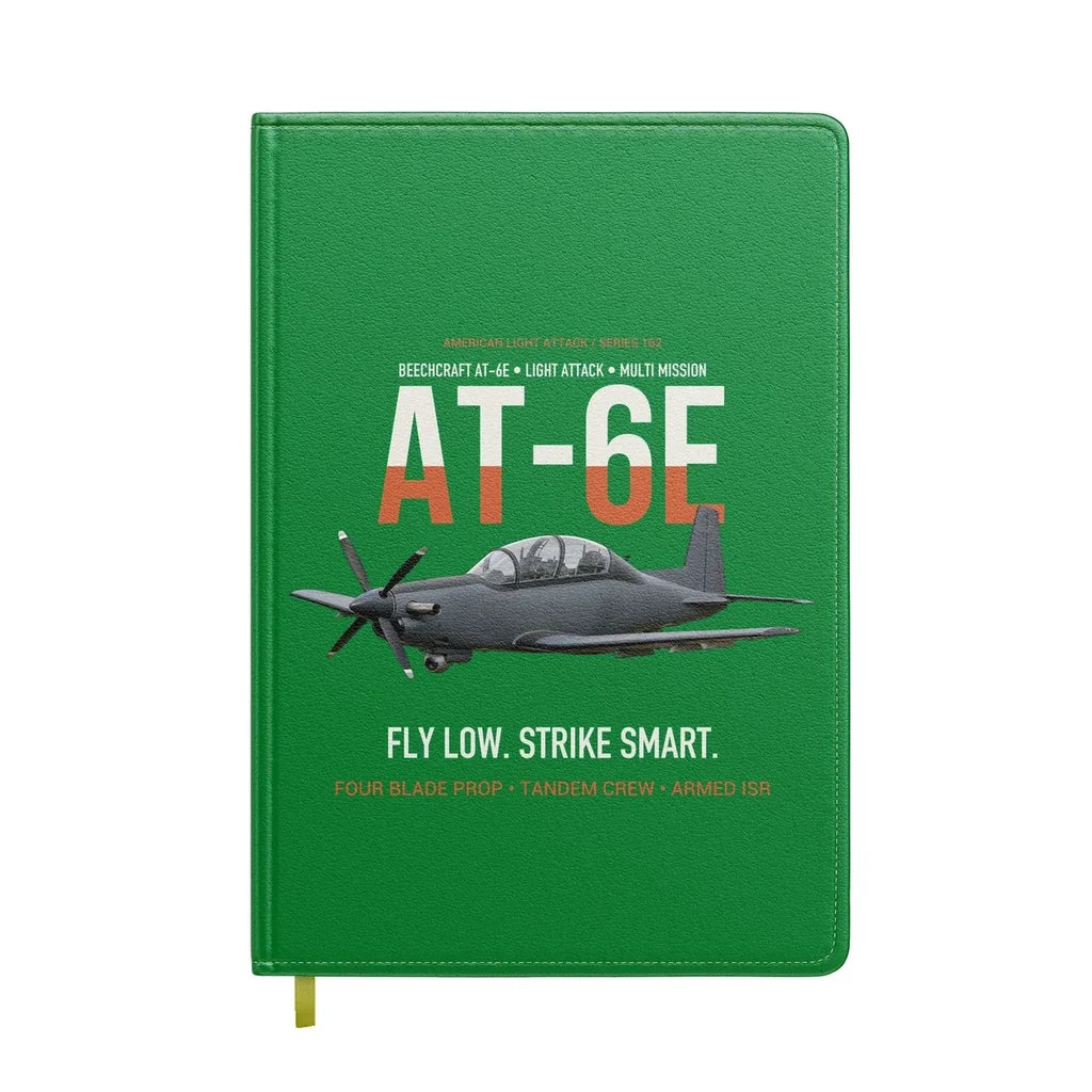 AT-6E Wolverine Light Attack design on green notebook