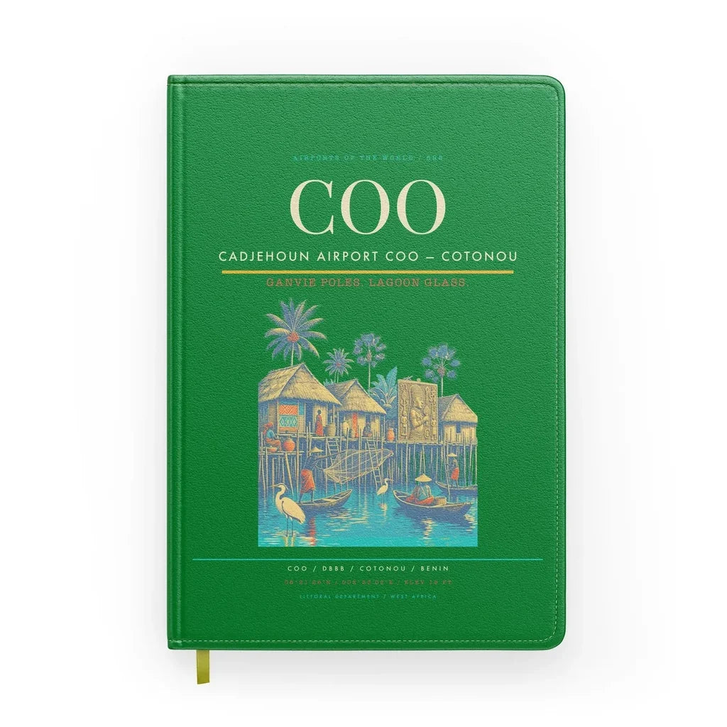 Cadjehoun Airport (COO) design on green notebook