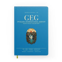 Thumbnail for Spokane International Airport (GEG) design on turquoise notebook