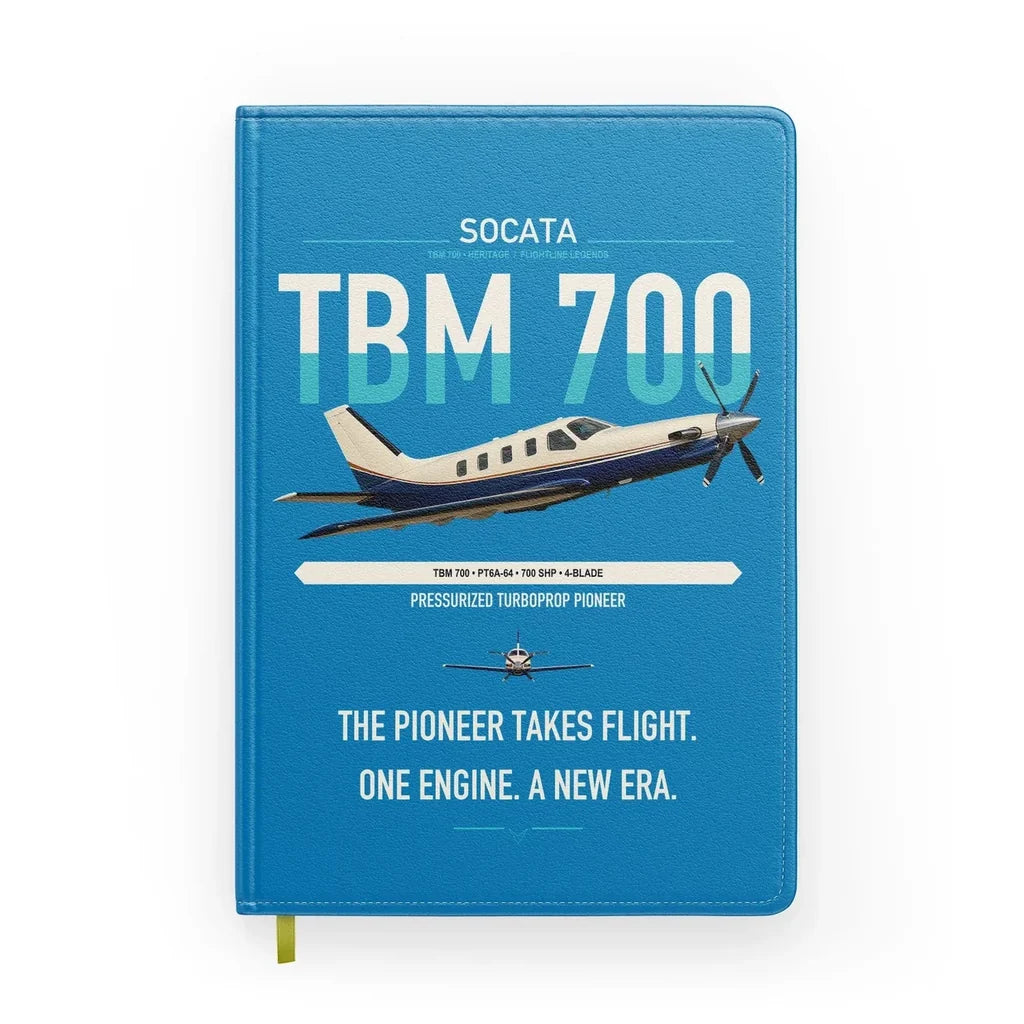 Socata TBM 700 design on turquoise notebook
