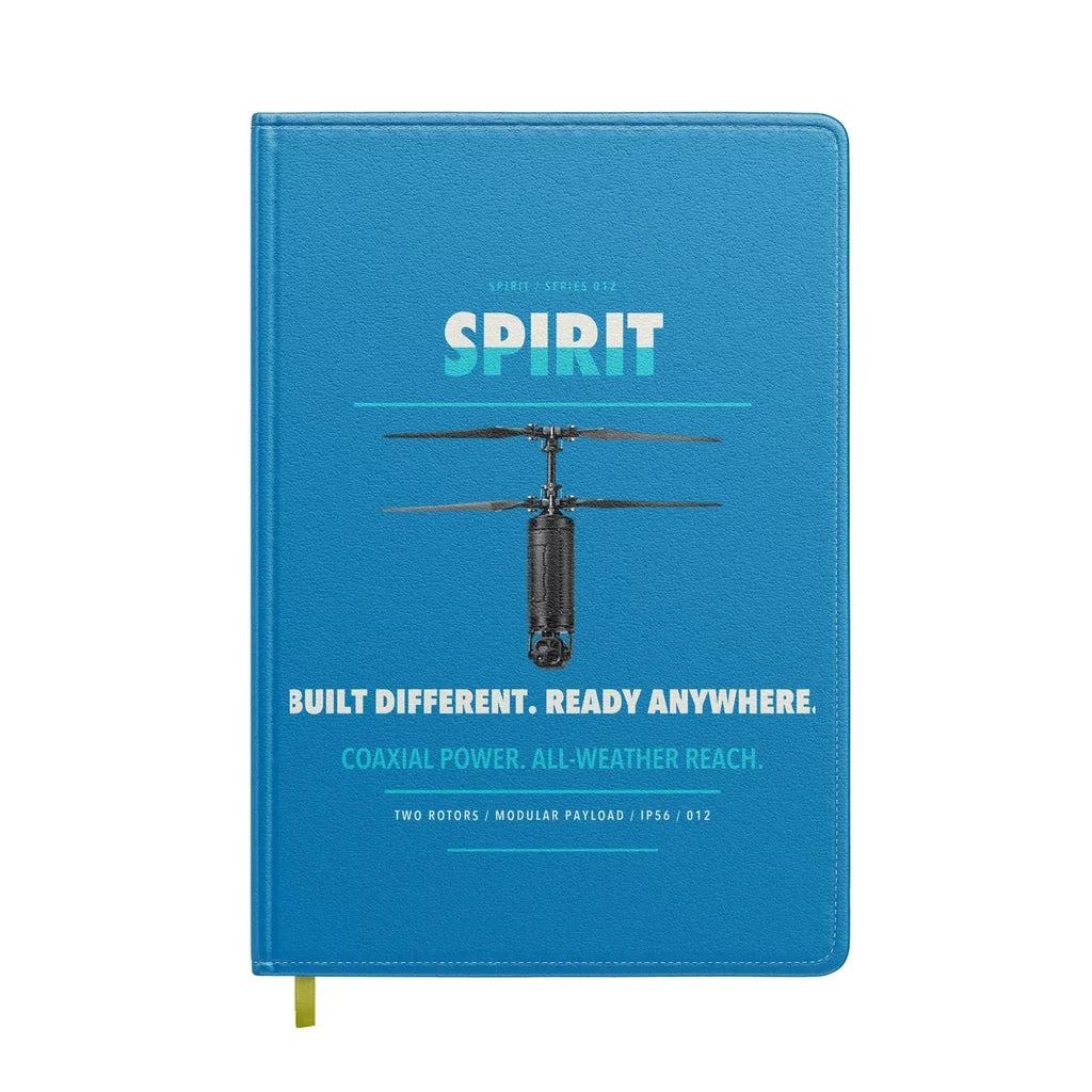 Ascent AeroSystems Spirit design on turquoise notebook