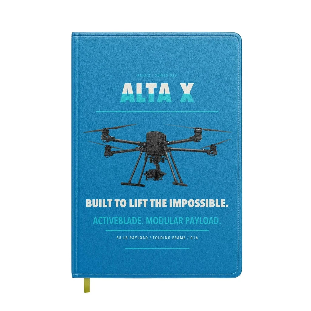 Freefly Alta X design on turquoise notebook