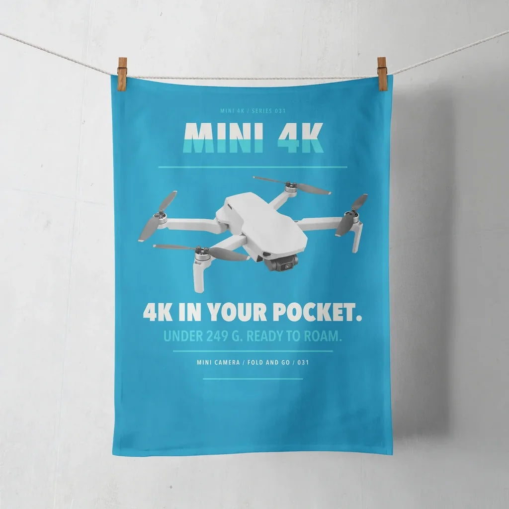 DJI Mini 4K design on turquoise towel