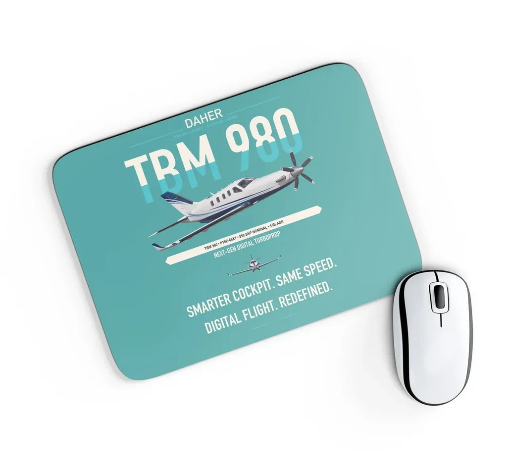 Daher TBM 980 design on turquoise rectangle mouse pad