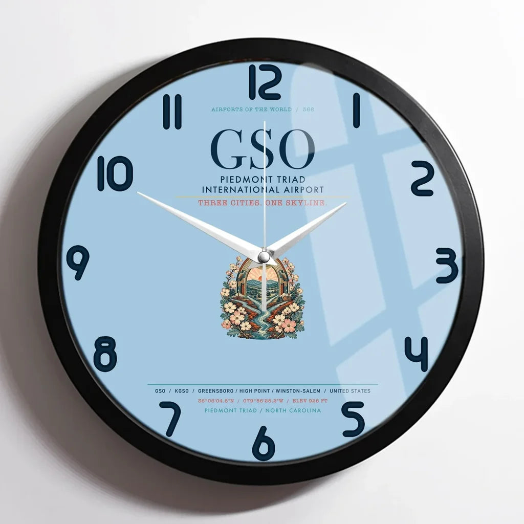 Piedmont Triad International Airport (GSO) design on light blue framed wall clock